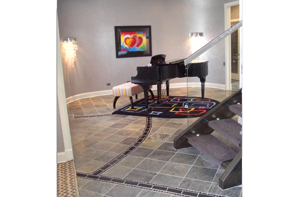 A simple Music Room. The goal was to take a space that was open to the foyer and do something special that wasn't more seating.
