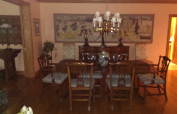 Georgian dining room with antique oriental accessories.